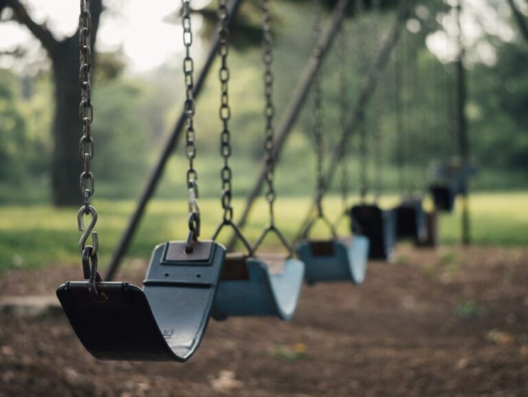 HOA swing set that requires routine HOA maintenance.
